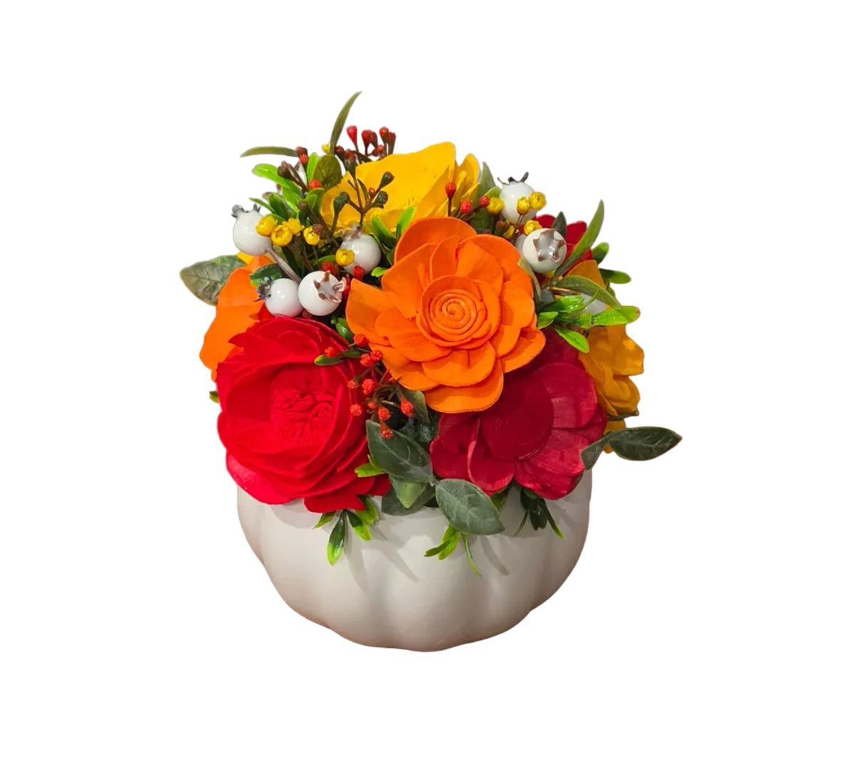 Back view of Autumn Cheer red, orange and yellow wood flower arrangement with berries and greenery in a white ceramic pumpkin.