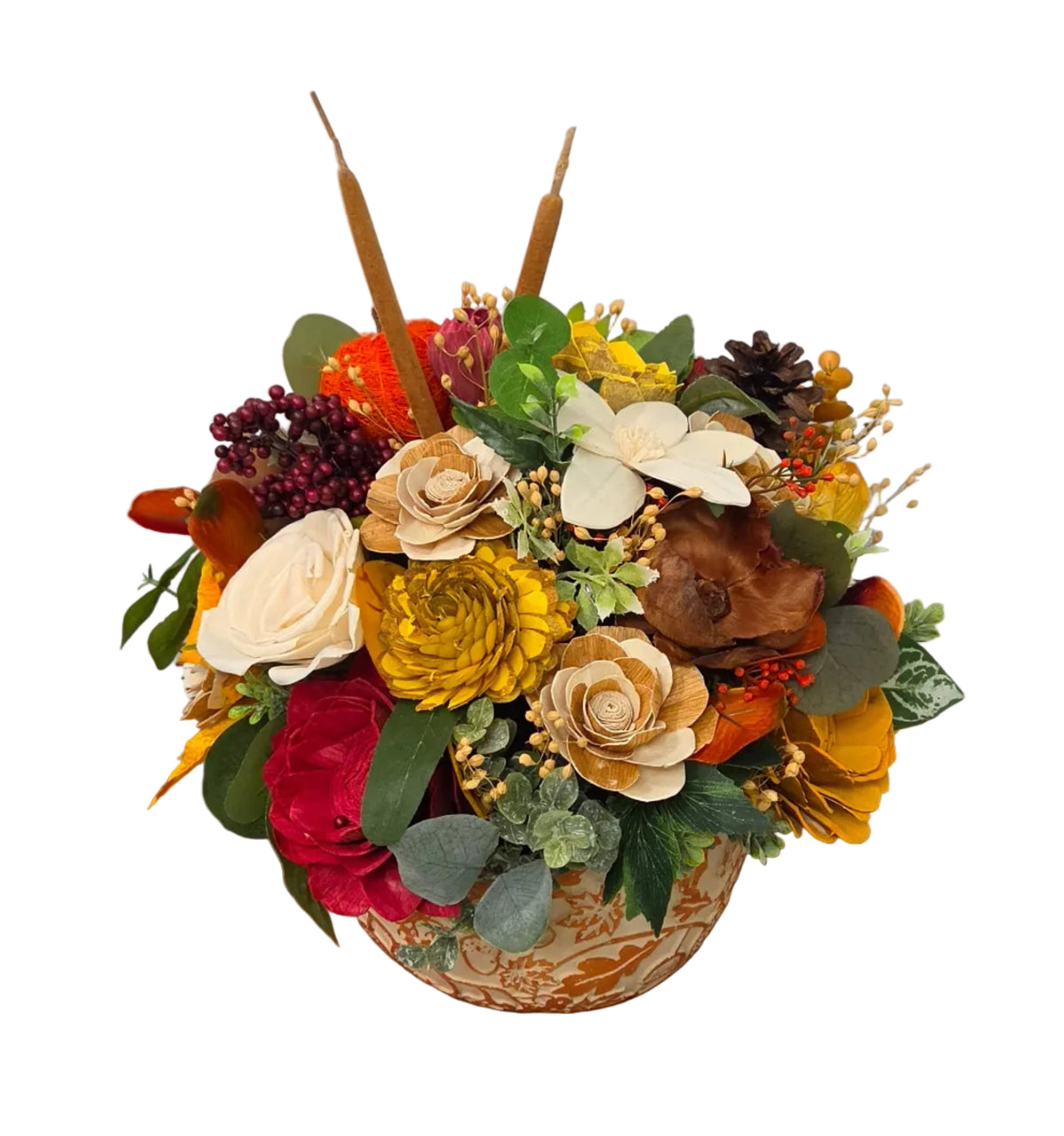 Back view of Harvest Glow fall wood flower arrangement with warm autumn blooms, greenery and natural accents in a fall leaf motif planter.