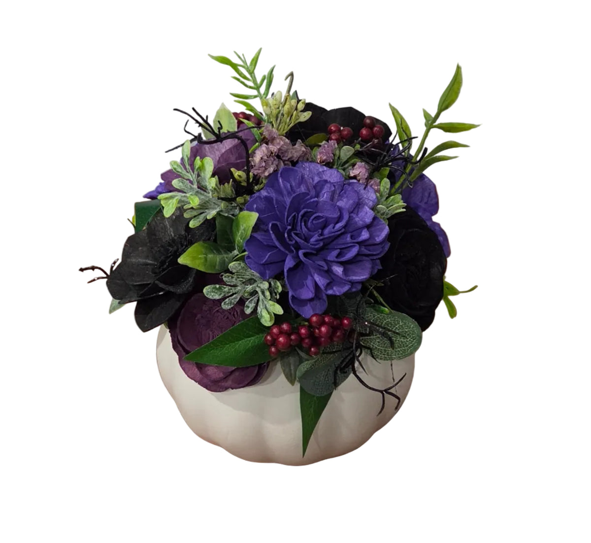 Witching Hour purple and black wood flower arrangement with burgundy berries and greenery in a white ceramic pumpkin.
